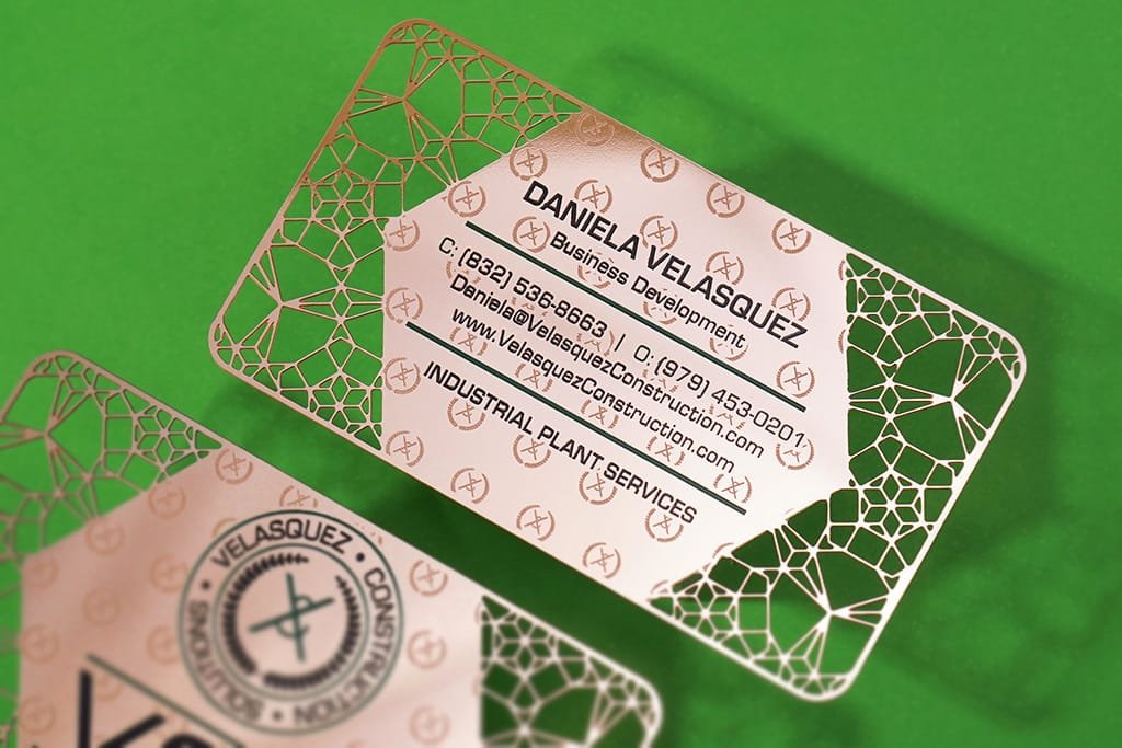 2 sided shiny finish rose gold metal business card, front and back sides, printed with 2 spot colors and a custom cutout pattern
